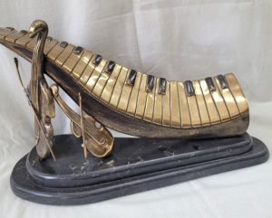 Bronze cello piano violin sculpture is an original and one of a kind made by Y. Ethan. He never duplicate his art works 31 cm X 15 cm X 28 cm approximately.