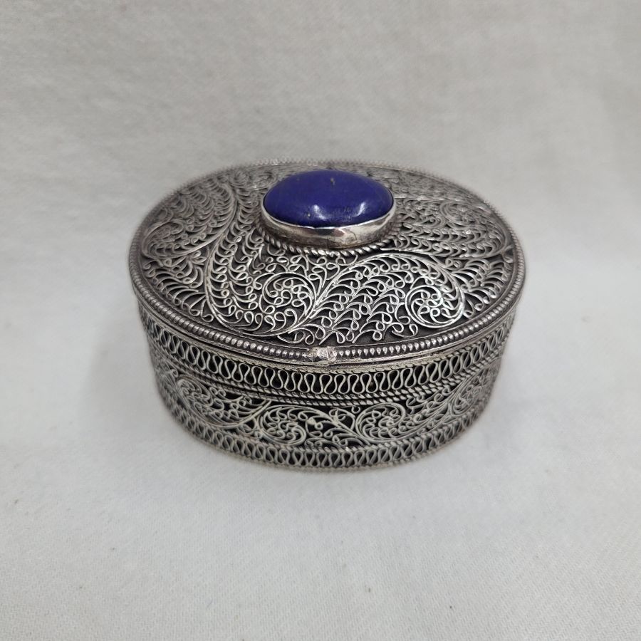 A Yemenite silversmith has made this intricate oval sterling silver Yemenite filigree vintage silver tobacco box portable tobacco box.