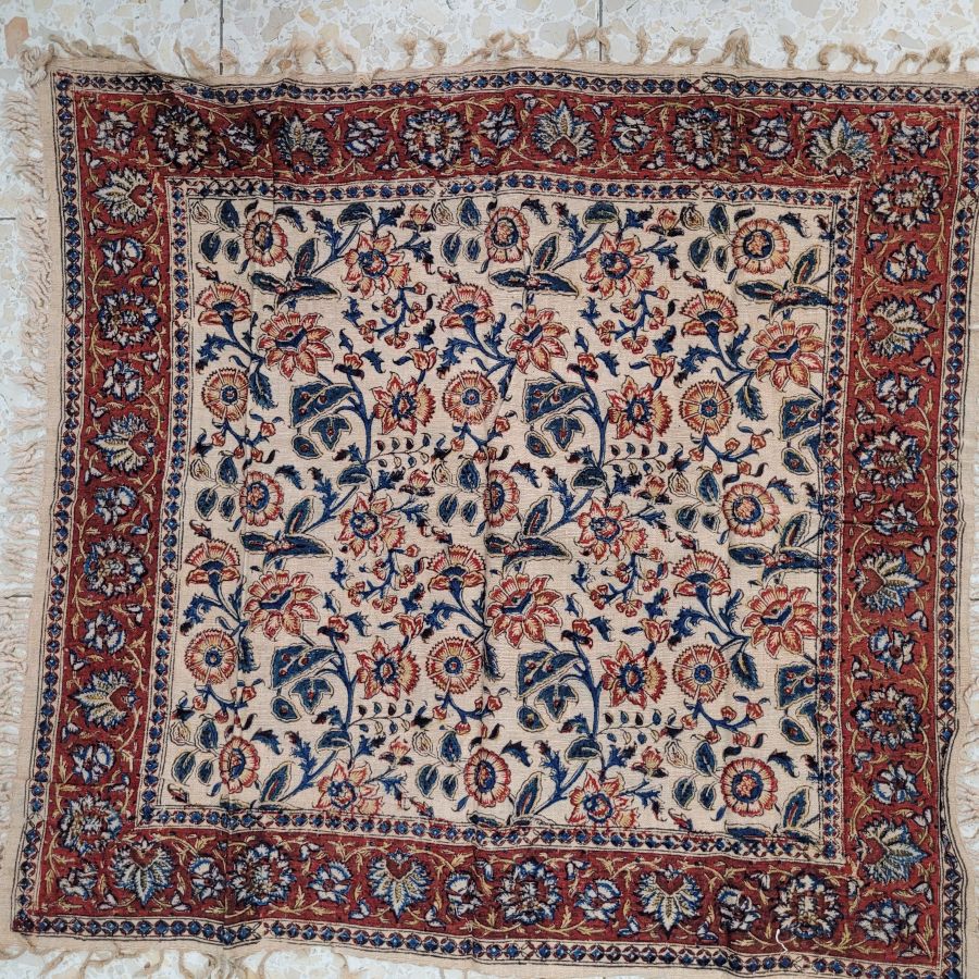 Handmade square Qalamkari four flower pattern cotton tablecloth, where are beautiful designs because of the different flowers.