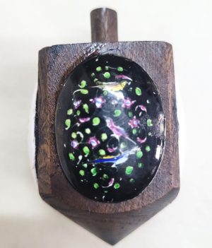 Handmade Hanukah oval shape enameled Dreidel with floral and birds designs on wood Dreidel. Dimension 3.7 cm X 3.7 cm X 7 cm approximately.