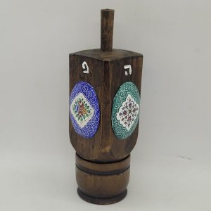 Handmade Hanukah huge DreidelĀ wood enameled oval floral enameled designs made by S. Ghatan ( Katan). Dimension 5 cm X 5 cm X 13.5 cm approximately.