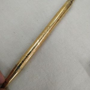 Vintage sterling silver gold plated ball pen handmade in Israel early 1960's with inlaid Judaic designs around pen diameter 0.8 cm X 12 cm approximately.