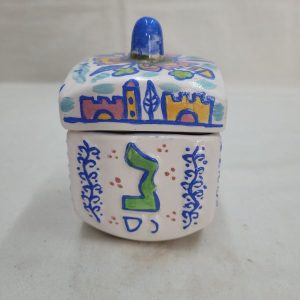 Hurwitz made this Dreidel shape box glazed where you can use to store sweets and chocolates. Dimension 7.5 cm X 7.5 cm X 10.5 cm approximately.