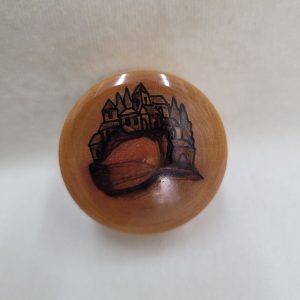 Small olive wood box Havdalah round shape with Jerusalem houses can be used also as a pill box. Dimension diameter 5.5 cm X 6.8 cm approximately.