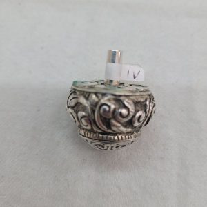 Sterling silver Hanukah Sevivon Dreidel floral embossed designs & leaf engravings. Made By S. Ghatan ( Katan) , diameter 2.5 cm X 3.5 cm approximately.