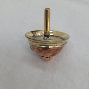 An original and one of a kind Contemporary brass Dreidel Sevivon design made by S. Ghatan Katan from Jerusalem diameter 3.5 cm X 4 cm approximately.