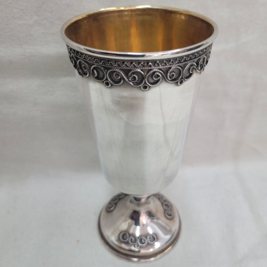 Sterling Silver fine Yemenite filigree cup with Yemenite filigree designs around. Dimension diameter 6.7 cm X 13.8 cm approximately.