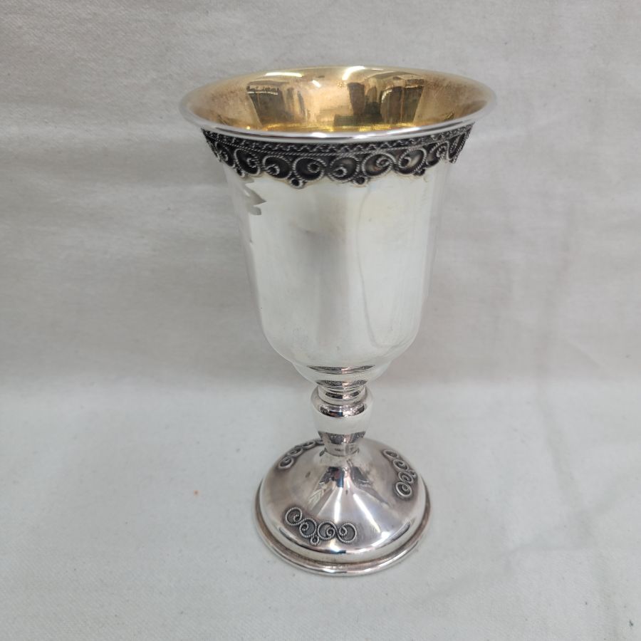Sterling Silver cup fine Yemenite filigree chalice with Yemenite filigree designs around. Dimension diameter 7.5 cm X 13.5 cm approximately.