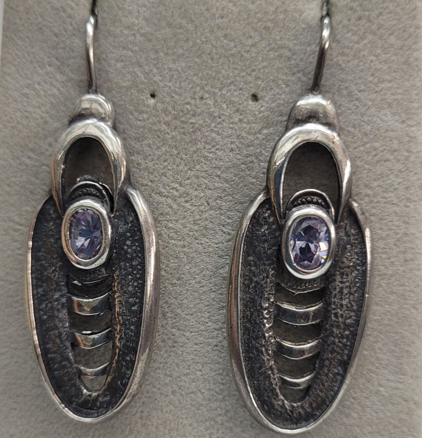 Sterling silver earrings bleu Topaz oval shape contemporary style. Price does not include local import tax, import tax is on buyer responsibility.