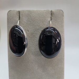 Sterling silver earrings oval Onyx contemporary style with sterling silver wires and a sterling silver frame. Dimension 2 cm X 1.3 cm approximately.