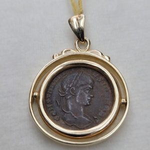 14 Carat gold swinging framed pendant set Roman coin genuine bronze fine condition Roman coin 4th century AD and swinging gold frame.