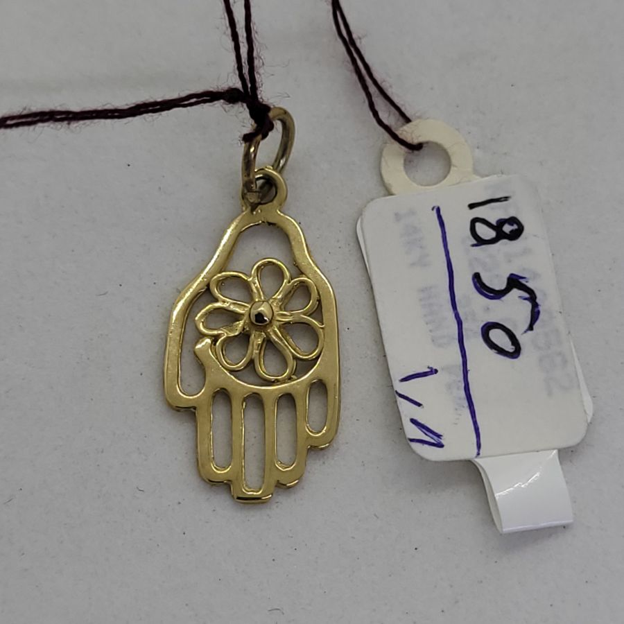 Handmade 14 Carat gold cut out Hamsa Chamsa pendant with twisted flower shape in center. Dimension 1.2 cm X 2.7 cm X 0.15 approximately.