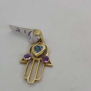 Handmade 14 carat yellow gold Blue Topaz Amethyst Hamsa Chamsa pendant, heart set with faceted blue Topaz stone and 2 Amethyst stones aside.